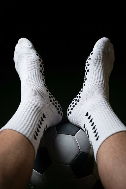 Semelles à picots de la chaussette Grip Pro face caméra